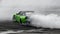 Blurred car drifting, Professional driver drive car drifting on asphalt street road race track, Automobile or automotive drift car