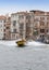 Blurred carabinieri police boat speeds along the Grand Canal of Venice, Italy
