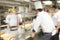 Blurred chef Cooking in restaurant kitchen