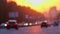 Blurred city traffic on highway at sunset. Lights