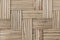 Blurred closeup shots of old used mat weaving thai handicraft in vintage tone