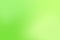 Blurred colored abstract background, vector illustration. Smooth transitions of shades of green colors