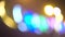 Blurred colorful jolly lights on dark background