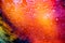 blurred colorful light and shadow red orange yellow of oil surface texture