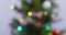 Blurred colorful lights flash hanging on Christmas tree