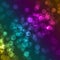 Blurred colourful sparkles defocused background