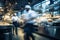 Blurred commercial kitchen with hurried cooks in motion blur