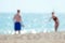 Blurred couple at beach.