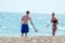 Blurred couple at beach.