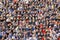 Blurred crowd of spectators on a stadium tribune