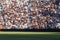 Blurred crowd of spectators on a stadium tribune at a sporting e