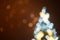 Blurred decorated Christmas tree and fireworks