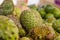 Blurred and defocus shot image of exotic tropical fruit, soursop display for sell