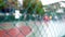 Blurred Defocused Background with Basketball Playground and Players on It