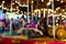 Blurred defocused background of traditional fairground carousel