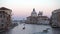 Blurred defocused of Basilica Santa Maria della Salute and traditional gondola
