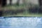 Blurred defocused image of heavy torrential rain. Rainfall flash flooding background