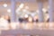 Blurred and defocused interior of a shopping center with department stores with Christmas and New Year decorations