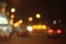 Blurred and defocused multicolored bokeh lights of night street