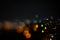 Blurred dramatic night view of city with abstract of LED, neon lights and beautiful bokeh.