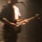 Blurred electric guitar player