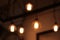 blurred a electric lamp lighting . modern and vintage style , interior ceiling hanging light bulb decorate at room