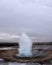 Blurred. The eruption of the Strokkur geyser in the southwestern part of Iceland in a geothermal area near the river Hvitau