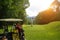 Blurred golfer playing golf beside the golfcar in beautiful golf course in the evening golf course with sunshine