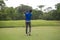 Blurred golfers are playing golf in the evening golf course in thailand. Golf ball and golf club in beautiful golf course at