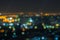 Blurred highway and skyline at night for corporate business concepts and urban city planning. Skyscrapers at twilight.