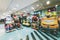 Blurred image of amusement park, children\\\'s rides in shopping mall