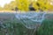 Blurred image of beautiful landscape.  Blurry shot of spiderweb over blurred nature background.