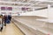 Blurred image of empty supermarket shelves due to Coronavirus induced stockpiling