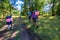 Blurred image.Group of People Hiking. Hikers with backpacks going on trail.