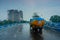 Blurred image, Kolkata, West Bengal, India. Image shot through raindrops falling on wet glass, abstract blurs of traffic -