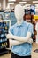 Blurred image of a mannequin dressed in blue boys school uniform at department store