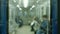 Blurred image of people in subway train.