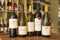 Blurred Image of a Row of Five Wine Bottles