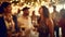 Blurred image of social gathering and party event with group of people out of focus drinking and having fun