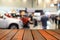 Blurred image wood table and motor show show room motor expo for
