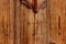 Blurred image of wooden texture background. Cropped shot of wooden wall. Abstract brown texture.