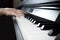 Blurred images of musicians` hands playing the piano