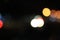 Blurred images of traffic lights at night with lots of bokeh and circles and colorful colors