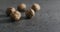 Blurred inshell walnuts on terrazzo countertop