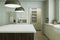 Blurred kitchen background with kitchen appliances and utensils with emphasis on the countertop