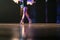 Blurred legs of ballet dancer on stage in theater