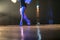 Blurred legs of ballet dancer on stage in theater