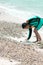 Blurred little boy walking at the sea