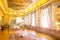 Blurred meeting hall in old luxurious style prepared for event