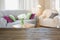 Blurred modern living room interior in rustic style with chair, soft divan. Abstract background for design.